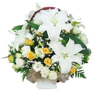 Basket of flowers from 3 lilies and 19 roses