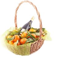 Basket with tangerines and wine