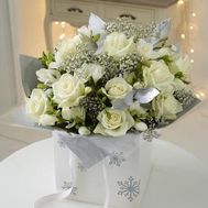 New Year''s bouquet of flowers from roses with gypsophila'