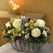 New Year basket of rose and orchid flowers