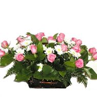 Basket of flowers from 12 chrysanthemums and 15 roses