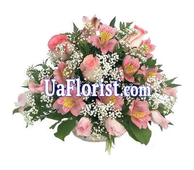 Basket of flowers from 11 alstroemerias and 3 roses Basket of flowers from 11 alstroemerias and 3 roses