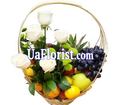 Basket with fruits and flowers Basket with fruits and flowers